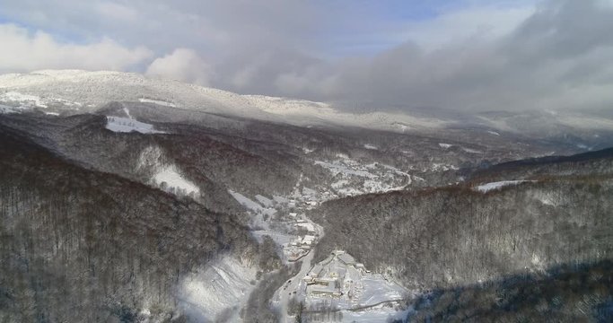 Aerial view: Landscape. Winter Nature. View of the mountain valley of the Runa. Transcarpathian Ukraine. 4k