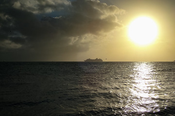   Cloudscape with cruiseship on the horizon