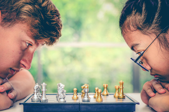 kids playing chess board
