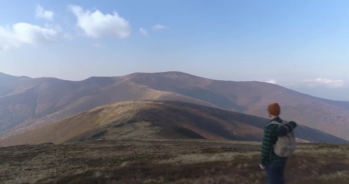 Aerial view: Flying over an amazing mountain near the peak of Gemba. 4k