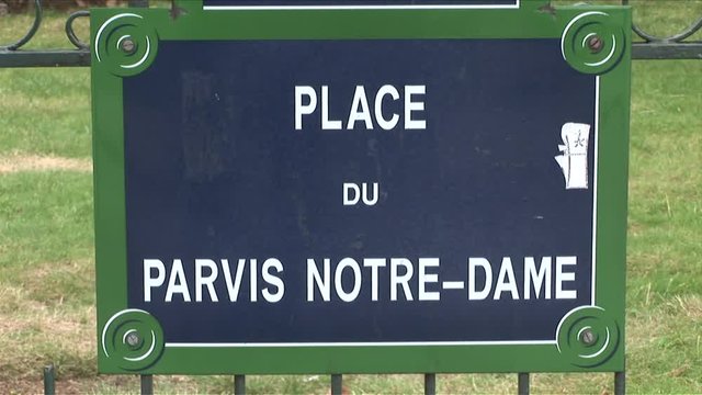 Close view of PLACE DU PARVIS NOTRE-DAME signboard in Paris France