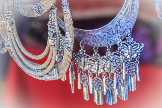 Beautiful traditional Hmong hill tribe silver ornaments for sale as souvenir at Doi Pui&rsquo;s Hmong ethnic hill-tribe village, Chiang Mai, Thailand.
