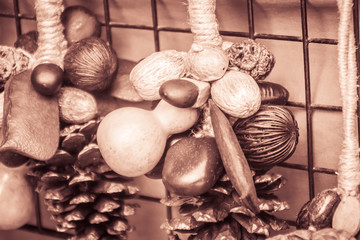 Mixed dry wild fruits seeds for sale as the souvenir, consisted of calabash, makha, pine and pong pong seeds for interior decoration.