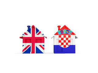 Two houses with flags of United Kingdom and croatia