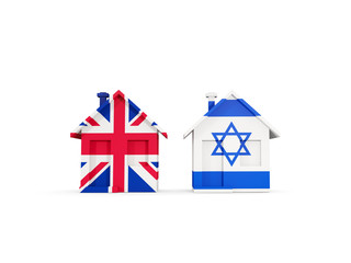 Two houses with flags of United Kingdom and israel