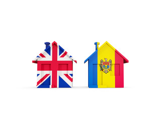 Two houses with flags of United Kingdom and moldova