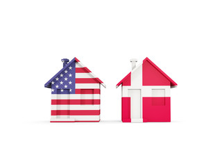 Two houses with flags of United States and denmark
