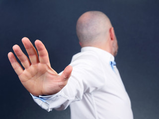 the negative gesture of men turned aside