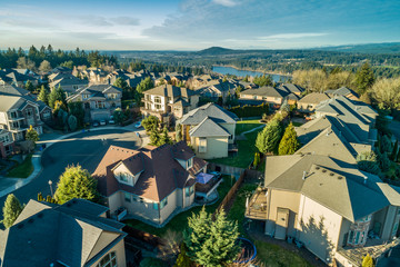 Beautiful luxury neighborhood in the Pacific Northwest photographed at sunset from the air