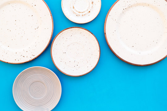 Download Mockup With Plates Empty Ceramic Plates On Blue Background Top View Copy Space Stock Photo Adobe Stock