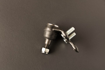 New car parts. Ball joint. Isolated on black background.