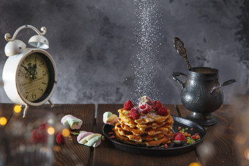 tasty belgian waffles with sugar powder