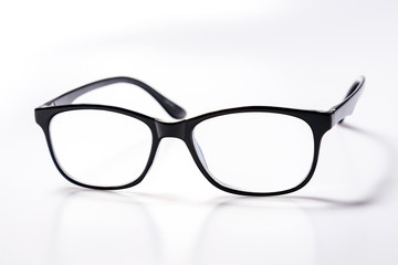 Black eye glasses spectacles with shiny black frame For reading daily life To a person with visual impairment isolaged on white background.