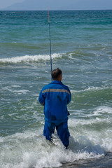 man fishing in the sea