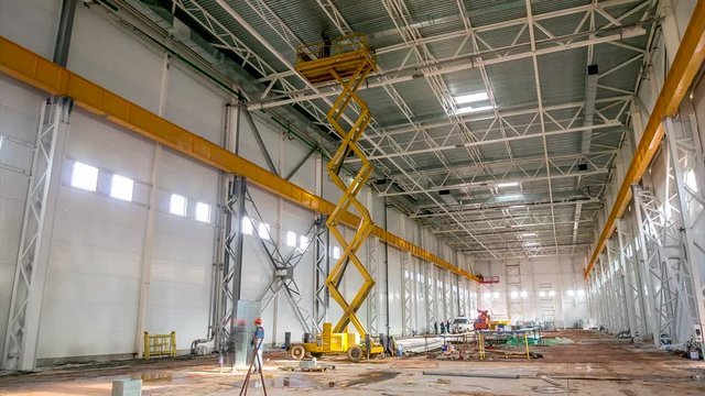 timelapse builders install ceiling in spacious factory shop