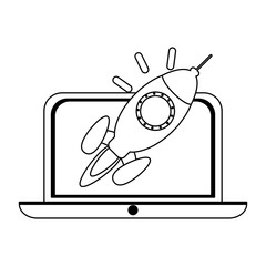 laptop with start up rocket on screen black and white