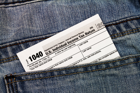 US tax form in trouser pocket