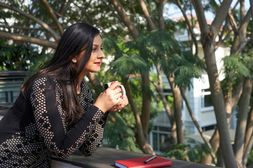 Fototapeta premium Woman enjoying morning coffee