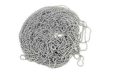 Yards of coiled metal linked jewelry chain