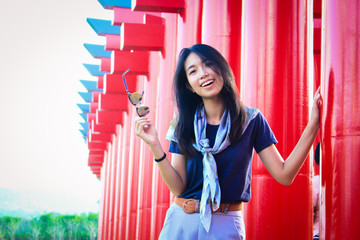 Woman and beautiful red poles