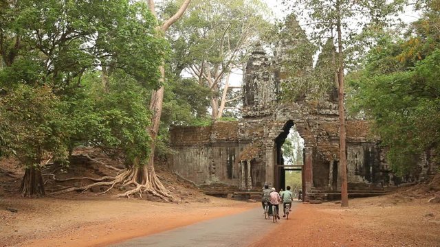 WS Traffic on road at ancient temple / Angkor Wat, Siem Reap, Cambodia