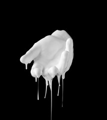 concept image of white paint dripping on female hand