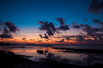 Fototapeta na wymiar Sunset reflected on water surface. Beautiful landscape