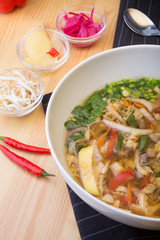 Asian soup of mixed vegetables served with ingredients