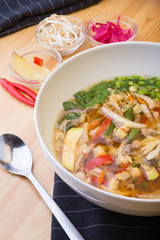 Asian soup of mixed vegetables served with ingredients