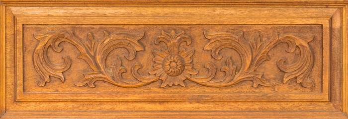 Fototapeta na wymiar Pattern of flower carved on wood background. Traditional Thai style pattern