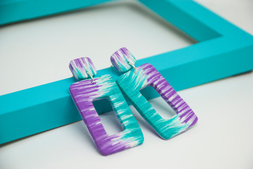 bright earrings turquoise and purple.