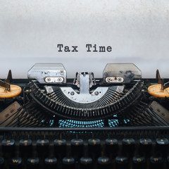 Old typewriter with word tax time