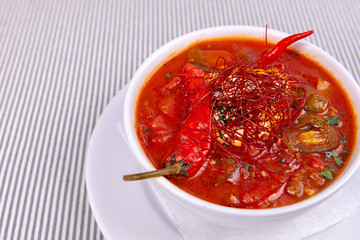 Hot red spicy soup served in restaurant