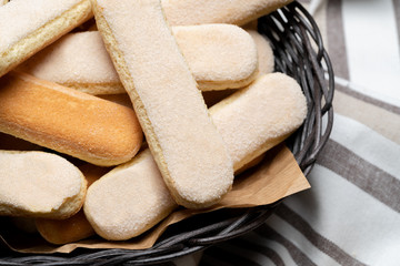 Italian Savoiardi ladyfingers Biscuits on wooden backgound with copy space