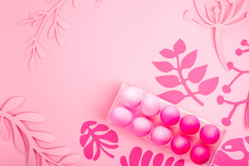 Easter 2019 with eggs painted in pink color on a monochrome background