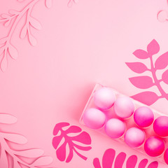 Easter 2019 with eggs painted in pink color on a monochrome background