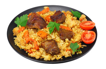 pilaf with meat on black plate isolated on white background