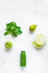 Green smoothie bottle and ingredients