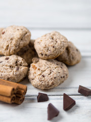 Homemade oatmeal cookies with dried fruits, nuts, chocolate and cinnamon