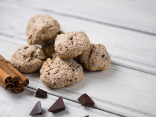 Homemade oatmeal cookies with dried fruits, nuts, chocolate and cinnamon