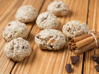 Homemade oatmeal cookies with dried fruits, nuts, chocolate and cinnamon