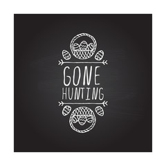 Hand drawn typographic easter element on chalkboard background