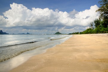 Sandy beach on the coast of the Prachuap bay in Prachuap Khiri Khan province of Thailand