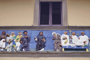 Detail of portal frieze of the Ospedale del Ceppo, Pistoia, Italy