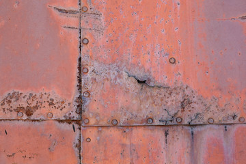 Old rusted metal texture. The surface of an uneven iron wall. Perfect for background and grunge design.