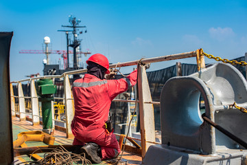 fireman prepare hose fire rubber standing by in the job site, ready to apply at once in case...