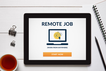 Remote job concept on tablet screen with office objects