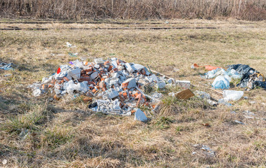 Garbage in the nature, Garbage dump on the grass near the forest ecological disaster concept...