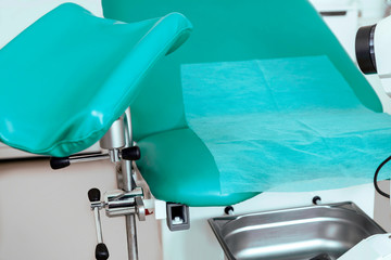 Gynecological room gynecologist chair equipment tool green