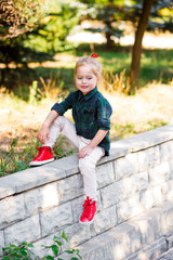 girl teen walk on grass with red sneaker